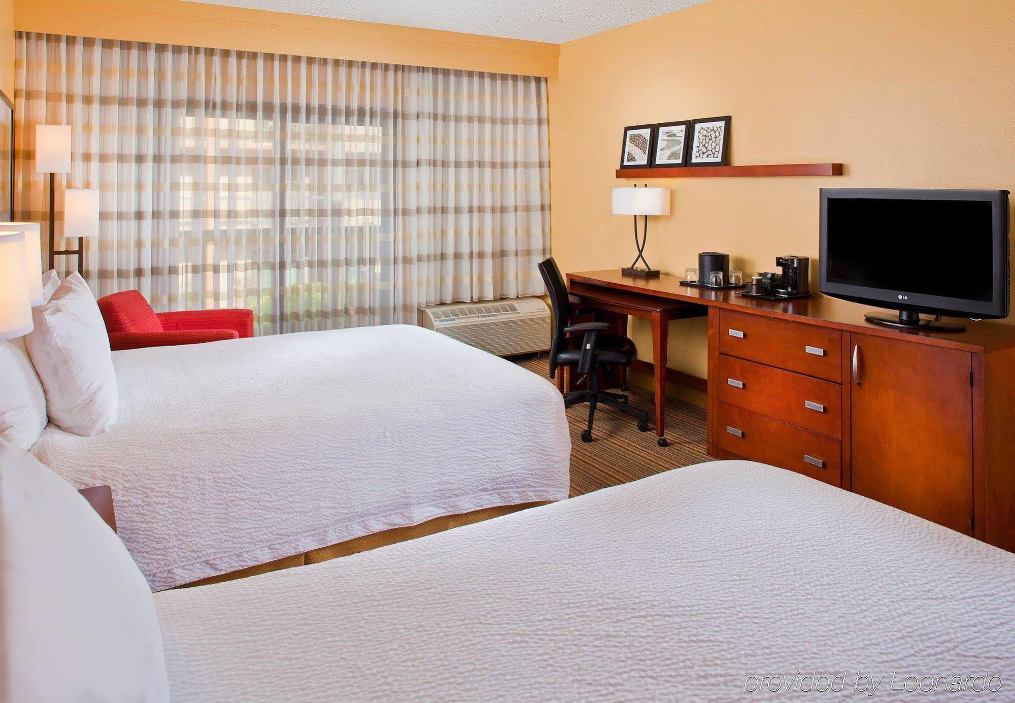 Courtyard By Marriott Orlando Airport Hotel Bagian luar foto